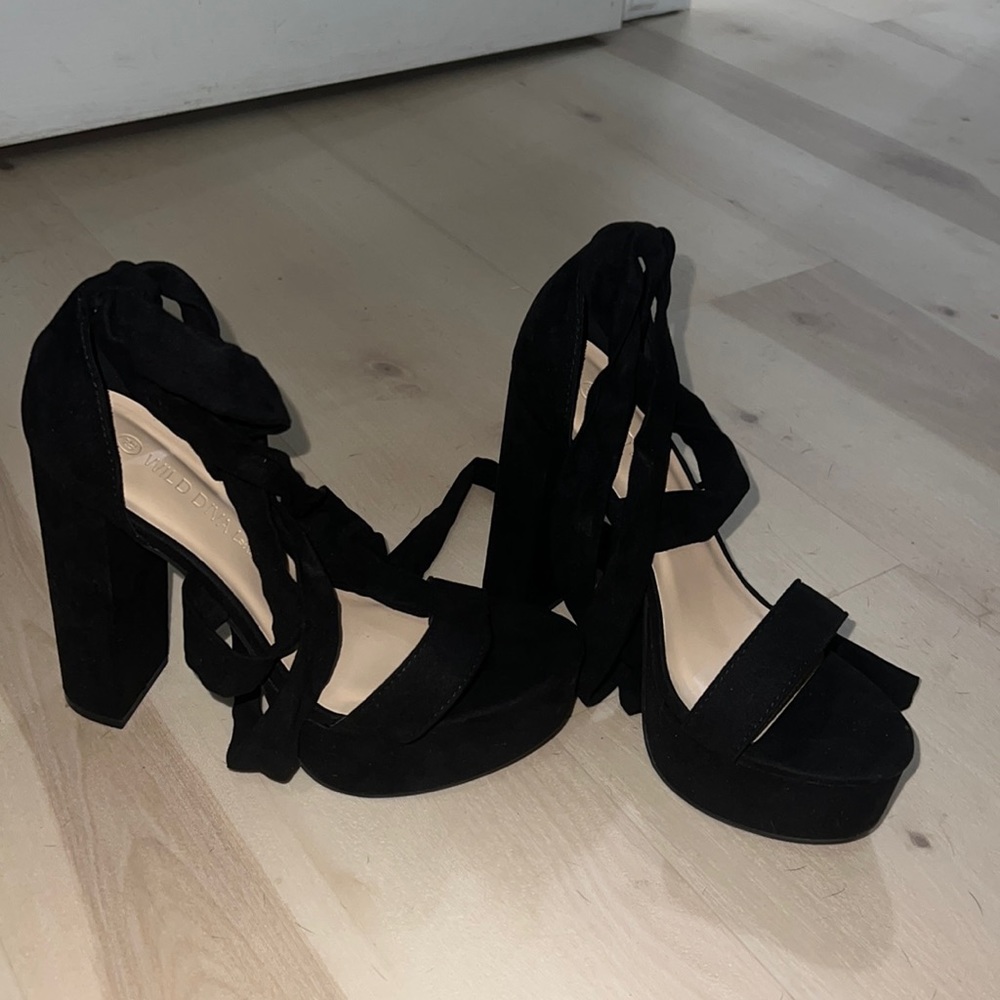 Super cute black platform heels.